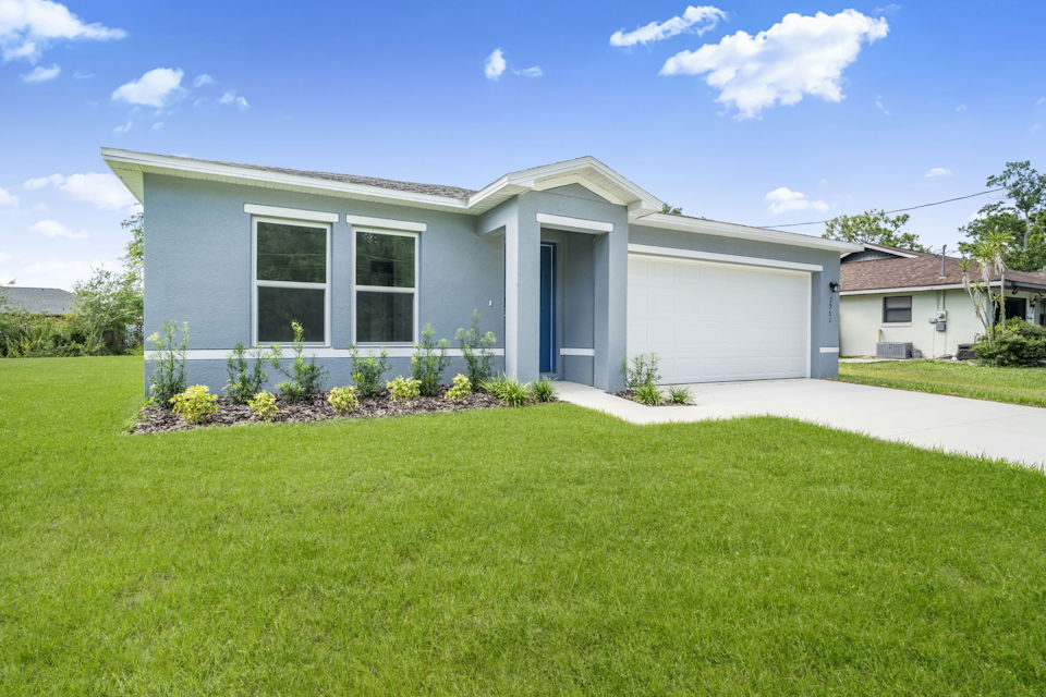 A house with a lawn.