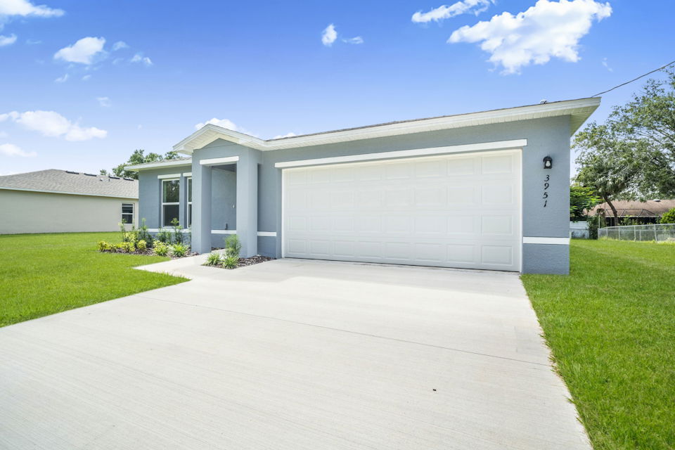A garage with a driveway.