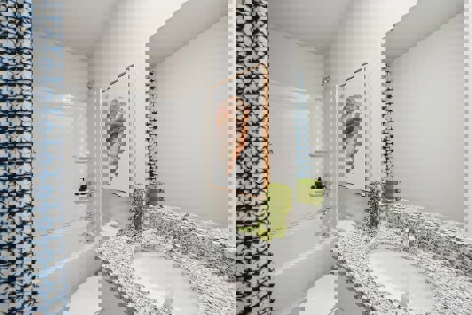 A bathroom with a sink and a bathtub.