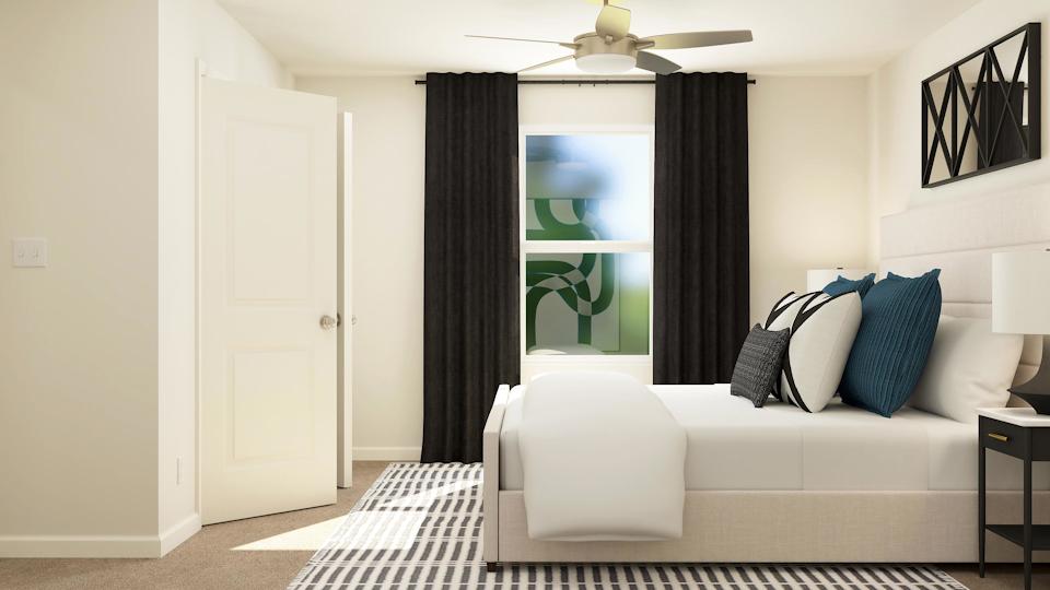 A white couch in a room.