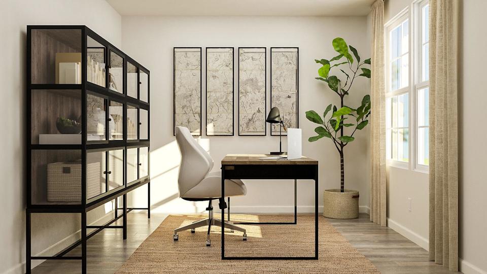 A room with a table and chairs.