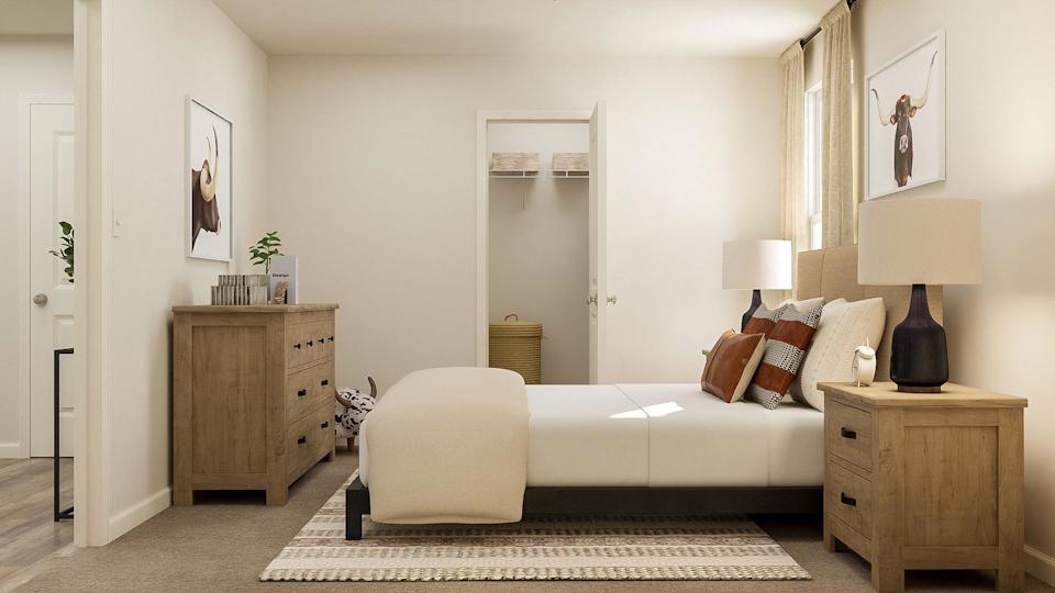 A room with a couch and a table.