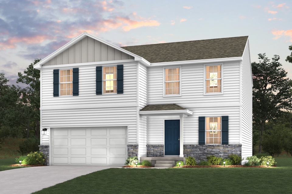 A white house with a garage.