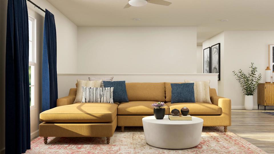 A living room with a couch and a coffee table.