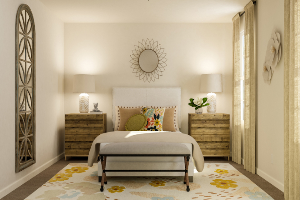 A bedroom with a bed and furniture.