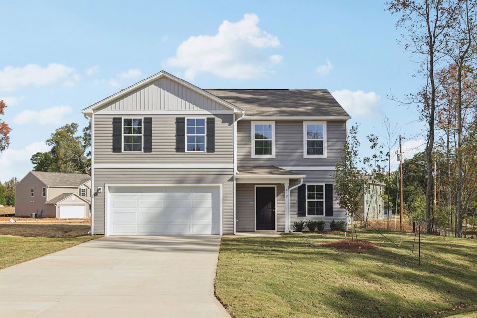 A house with a driveway.