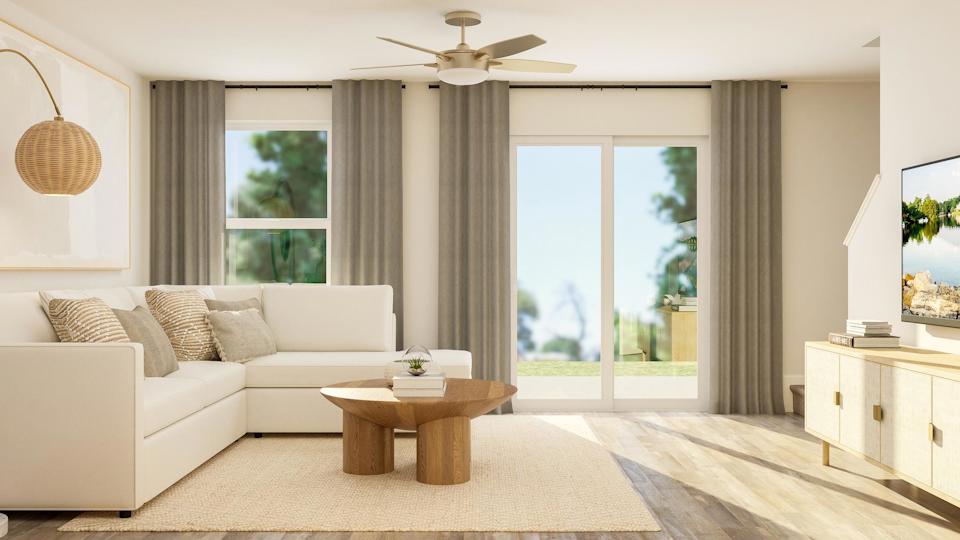 A living room with a large window.