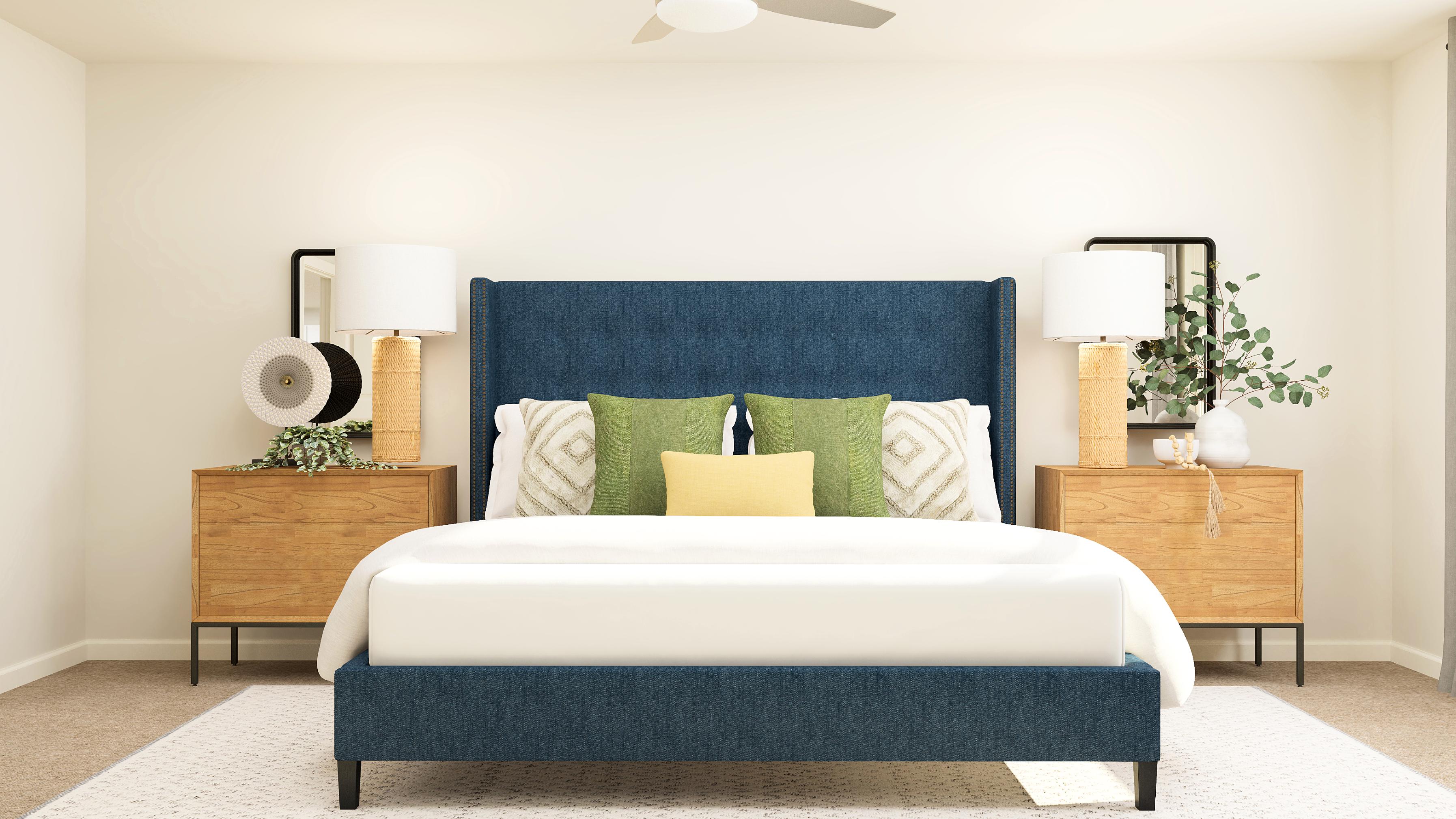 A room with a bed and lamps.