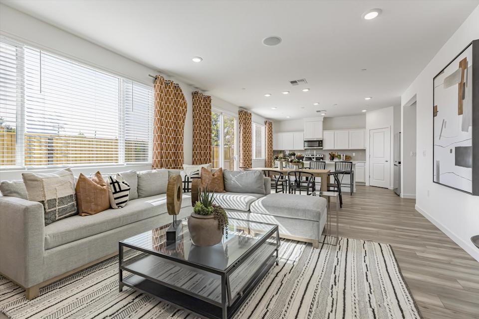A living room with a large window.